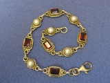 Sterling Silver Bracelet – Emerald Cut Garnets & Pearls – 8 1/2” long – Weight is 15.6 grams