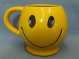 1970's Mc Coy Smiley Face Coffee Cup – Stands appx 4” Tall – Marked Mc Coy USA