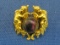 Small Vintage Pin/Brooch – 2 Figures beside center stone – Signed “Freirich” - 7/8” in diameter