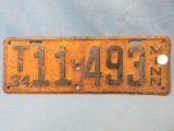 1934 Minnesota License Plate – Black lettering on Yellow background - “T11493” - 12 3/4”L x 4 1/2”T