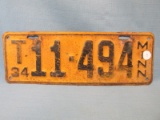 1934 Minnesota License Plate – Black lettering on Yellow background - “T11494” - 12 3/4”L x 4 1/2”T