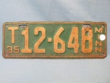 1935 Minnesota License Plate – White lettering on Green background - “T12648” - 12 3/4”L x 4 1/2”T –
