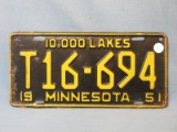 1951 Minnesota License Plate – Yellow lettering on Black background - “T16694” - 11 7/8”L x 6”T – As