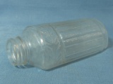 Vintage Half Round Bottle with Pressed Decoration 5” L x 2 ¼” W X 1 3/4” Thick