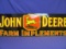 Metal Sign “John Deere Farm Implements” - Measures 42” x 13”