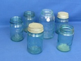 Set of 6 Blue-Tinted “Ball” Brand Mason Jars – 2 with Lids – Tallest is 7” -