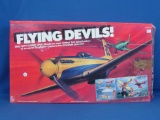 1985 “Flying Devils!” – Two 5 ½” x 7” Plastic Planes In Box – All Parts Included! -