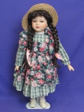 Porcelain Doll with Stand – Dark Braids – Blue eyes – 17” tall