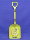 J. Chein Tin Litho Toy Shovel – Sailor on a Ship – 14 1/4” long – Some paint loss & wear