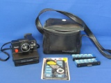 Vintage Polaroid Camera & Set of Used and Un-used Flashbars in Black Case -