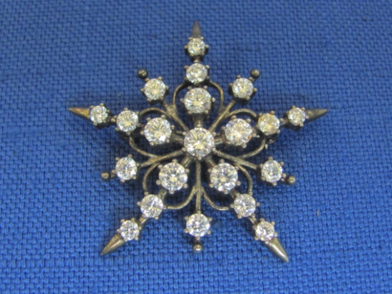 Sterling Silver Snowflake Pin w Cubic Zirconias – 1 5/8” in diameter – Weight is 8.0 grams