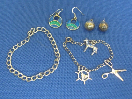 Sterling Silver Jewelry: 2 Charm Bracelets (1 empty) 2 Pairs of Earrings – Total weight is 18.0 gram