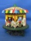 Very Cool Painted Cast Iron Circus Carousel just over 5” T  on 4 1/2” DIA Base