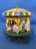 Very Cool Painted Cast Iron Circus Carousel just over 5” T  on 4 1/2” DIA Base