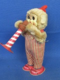 7” Tall Wind Up Tin Toy – Japan – Monkey plays horn, lifts it up & Squeaks & brings it down & back u