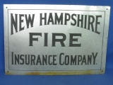 “New Hampshire Fire Insurance Company.”  Metal sign – patina or use  12 1/4” T x 18: W