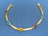 Sterling Silver Vermeil Bracelet w Different Stones – 7 1/2” long – Weight is 11.4 grams