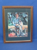 Framed Modern-Art Style Painting of Man Sitting on Stool – 12 ½” Wide by 16” Long -