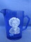 Blue Glass Shirley Temple Syrup Pitcher – Captain January Image – Quaker Oats Premium