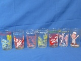7 Vintage Cartoon Character Jelly Glasses with embossed Face on the bottom – Each 4 1/4” Tall