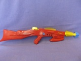 1950's Pyrotomic Disintegrator Ray Gun – Red Plastic Body with crank acrtion Popping & Moving Yellow