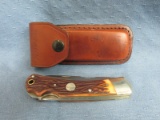 Remington Folding Knife – 8 3/4”L(open) – Leather case – Like new condition – Made in USA