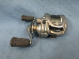 Daiwa Exceler Fishing Reel - “4.9 100P”  – Appears to be in great used condition – As shown