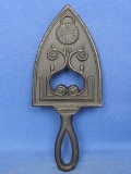 Vintage Cast Iron Trivet – Flat Iron Shape – Marked but can't make it out – Nice Design