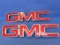 2 GMC Medallions from a Truck (Both Sides) Each appx 13” L – Plastic
