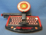Vintage Junior Dial Typewriter Tin Toy – Marx Toys – 11”W x 8” x 6 3/4”T – Made in USA – As shown –