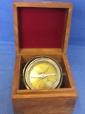 Decorative “Ship's Compass” in a Wooden Box – Balanced inside a frame that acts like a gyroscope