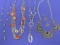 4 Costume Necklaces – 1 is Lia Sophia – 1 has matching Earrings – Good condition