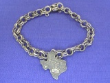 Sterling Silver Charm Bracelet with Texas Charm – 8” long – Weight is 17.2 grams