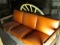 Retro Orange Vinyl Covered  Couch – 29” T -  27” x 67” - As Shown
