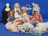 8 Small Dolls – Most are Storybook Dolls by Nancy Ann – Cowgirl has Metal Gun – 6” to 7 1/2”