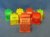 Las Vegas Miniature Plastic Slot Machine Key Chains (8) – One Dated 1972 – All Spin