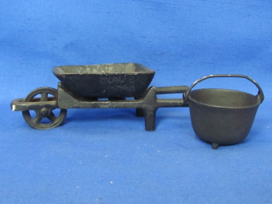 Cast Iron Wheelbarrow & Handled Pot – Wheelbarrow is 6” long – Good condition, as shown