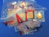 Lot of 77 US Mint Tokens – All in Sealed Packages – Size of a penny