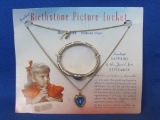 1955 Child's Birthstone Picture Locket & Bracelet – September on Original Card