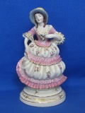 Heavy Porcelain Lady Figurine- Remains of Old Sticker on Base – 8 1/2” tall – Age Unknown