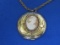 Round Goldtone Locket Modified with Vintage Shell Carved Cameo – Locket is 1 1/2” in diameter
