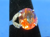 Sterling Silver Ring with Orange Faceted Stone – Size 7 – Total weight is 4.0 grams