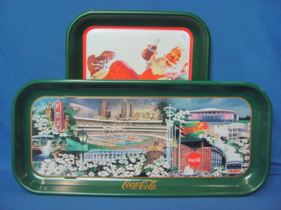 2 Coca-Cola Trays – 1990 Santa Claus (13 1/4” x 10 1/2”) & 1996 Atlanta Olympics (19” x 8 1/2”