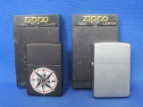 2 Zippo Lighters: Matte Black with Compass Symbol – Silvertone dated 2000 – With Cases