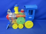 Ideal Wind-up Musical Whistle Plastic Toy Train 11”L x 4 ½”W x 8”H Tested & Works -