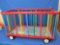 Colorful Wood Toy Pen on Wheels by the Gong Bell Company – 26” x 13 1/2”