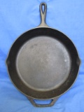Lodge Cast Iron Skillet Marked 10SK  it's a 12” round skillet with 18” L from hanger to handle