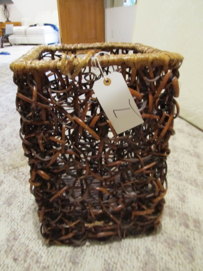 Wicker basket or plant pot cover; dark color
