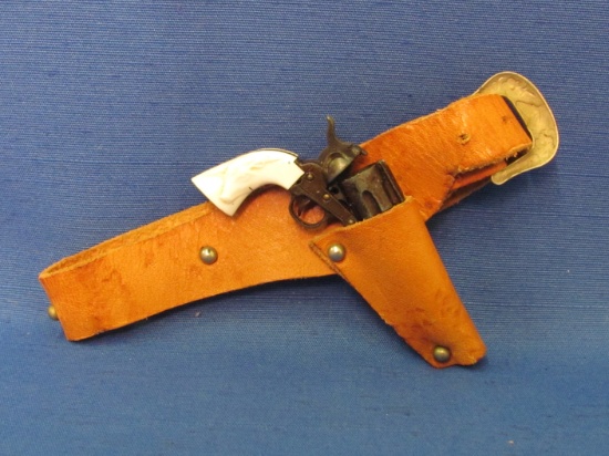 Tiny Metal Pistol with Leather Holster – Gun is 3 1/4” long – Belt is 13” long