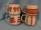 Set of 4 Ceramic Mugs - All in the same style w/ a unique design on each - Unmarked